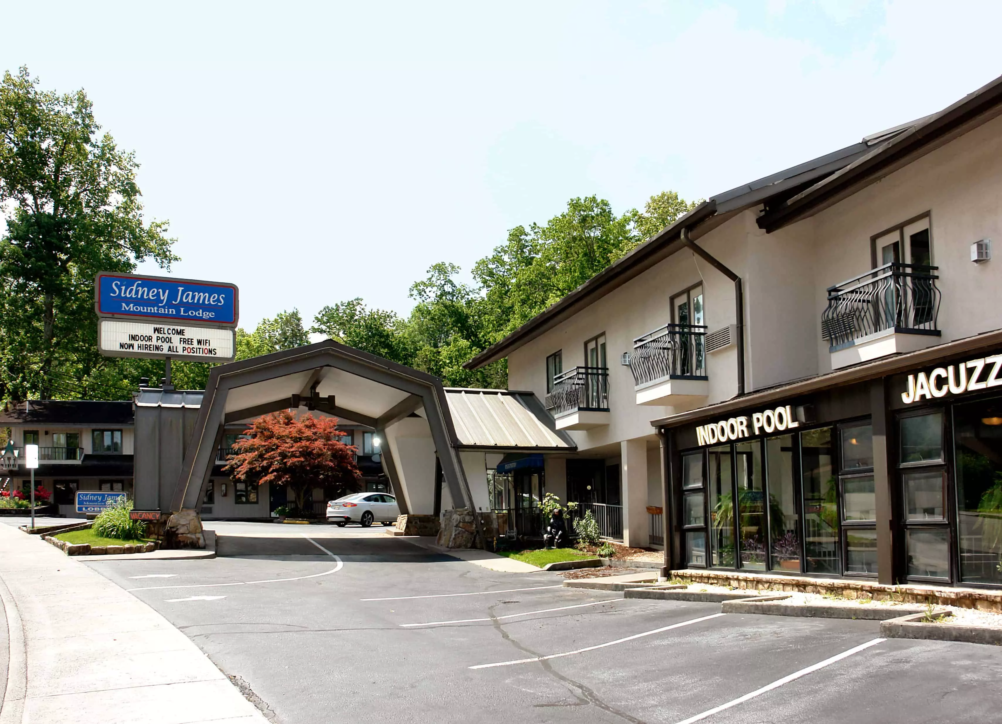 parking lot and entrance to Sidney James Mountain Lodge in Gatlinburg