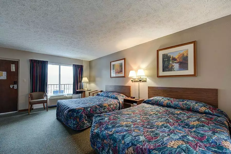 Double Queen beds inside of Courtside Double Queen and Balcony Room