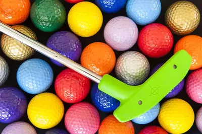 mini golf club and balls