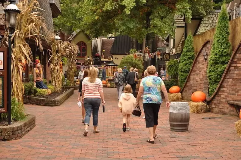 Shoppers walking through The Village in Gatlinburg TN.