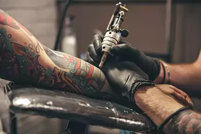 Man getting tattoo