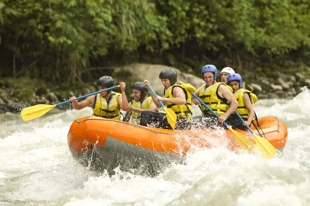 People white water rafting