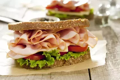ham sandwich with lettuce and tomato