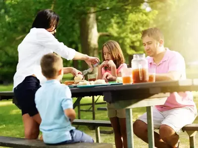 family having a picnic in the mountains