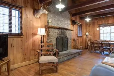 Inside of cabin in downtown Gatlinburg by Sidney James