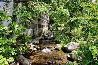 Balconies overlooking a mountain stream in Gatlinburg TN