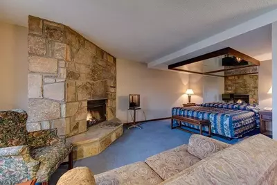 fireplace and living area in sidney james hotel suite